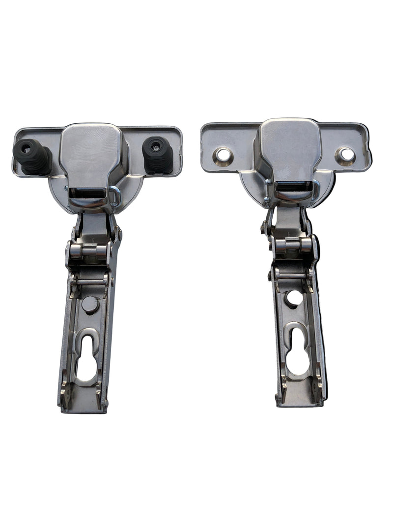Load image into Gallery viewer, Two cabinet hinges with attached screws and dowels on a clear surface.
